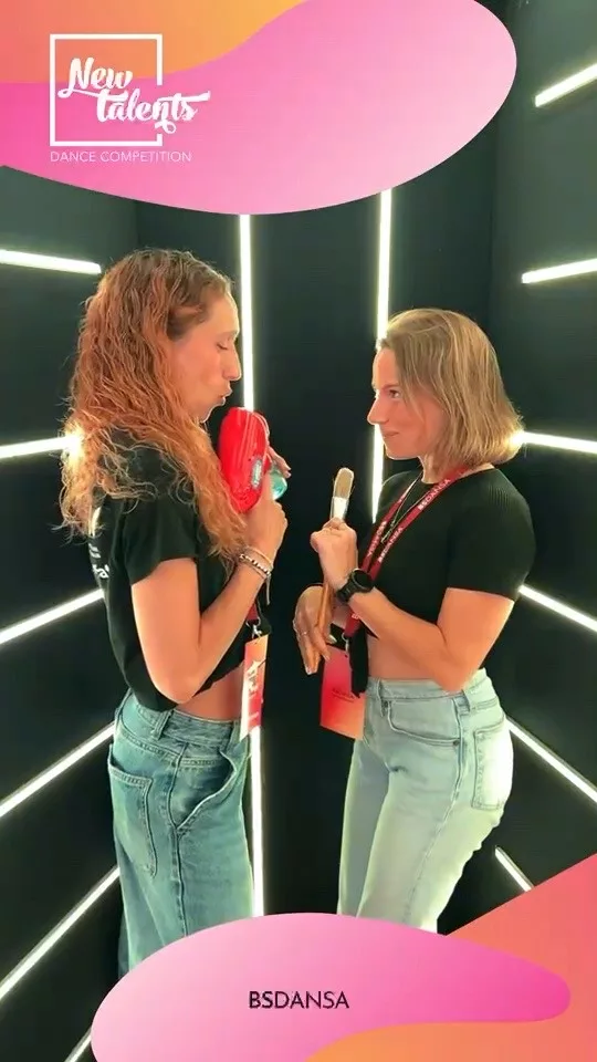 Group of guests posing in the Glam Video Booth light tunnel